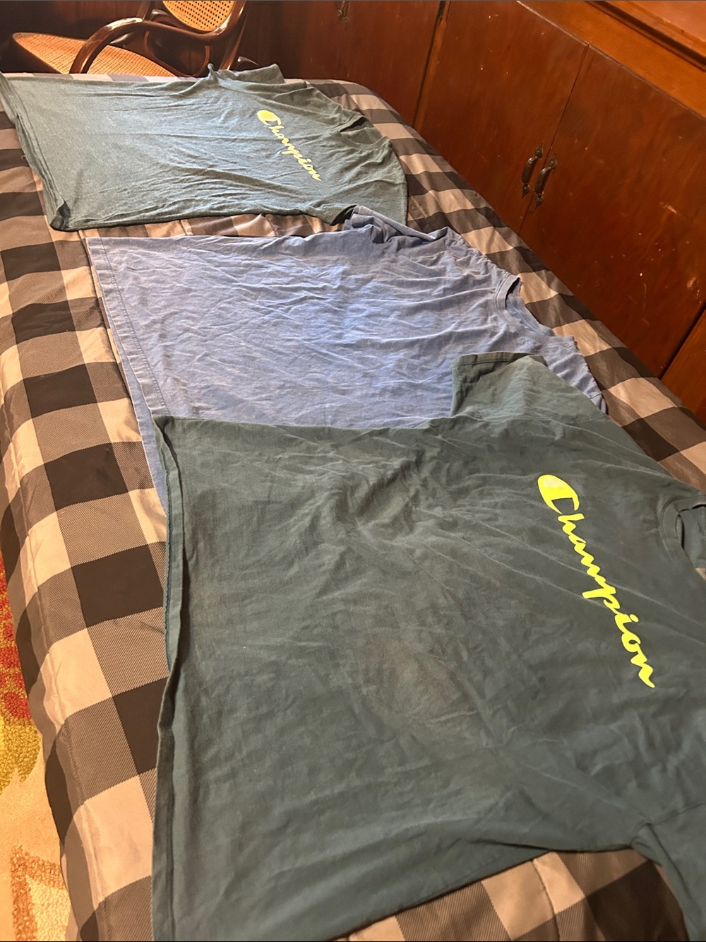 3 men’s tees, 2 Champion Men's Short Sleeve Tee w/Yellow Logo & 1 Original Logo